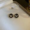 Black retro flower butterfly earrings temperament high-end stud earrings fashion niche versatile light luxury earrings