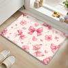 Pink ribbon, floral, and heart patterned floor mat, machine washable polyester, suitable for bedroom and living room decoration.