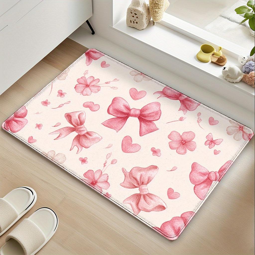 Pink ribbon, floral, and heart patterned floor mat, machine washable polyester, suitable for bedroom and living room decoration.