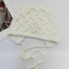 Retro twist pattern ear protection knitted hat women's autumn and winter lace-up bow wool hat warm cover cold hat