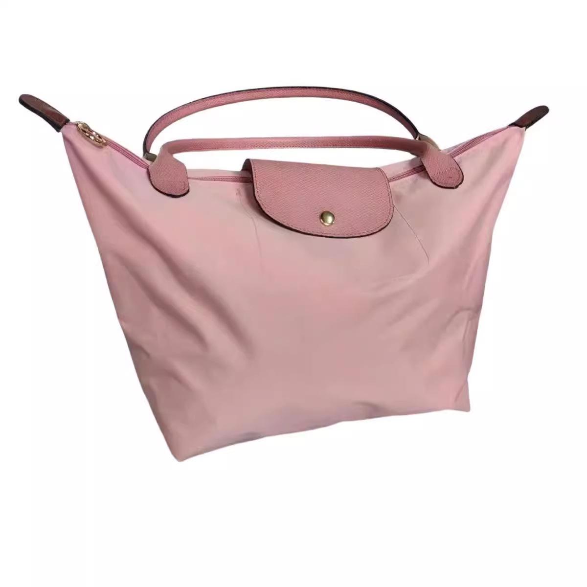 

Элегантная сумка-пельмень: Стильная, Универсальная и Складная Женская Сумка через Плечо Large розовый