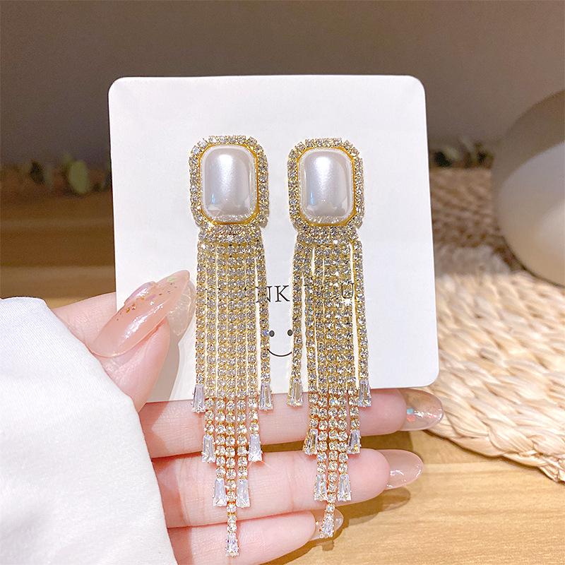 

Серьги-кисточки из серебра S925 с французским жемчугом для круглых лиц - Стройнящие, универсальные и с преувеличенным подвесным дизайном