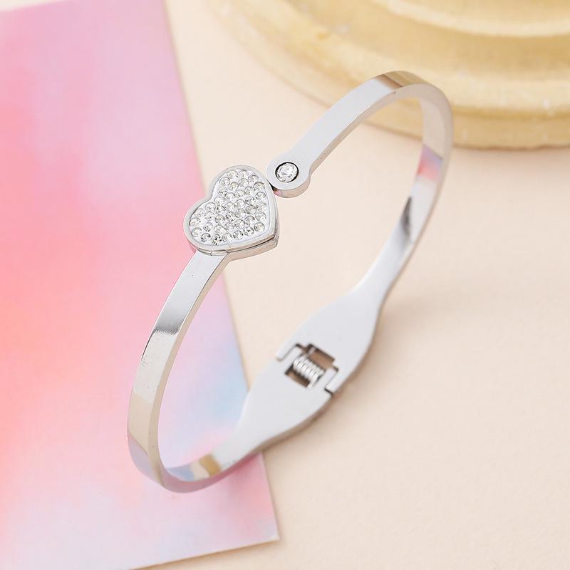 Heart-shaped Zirconia Inlaid Titanium Steel Bracelet for Women - Open Spring European Style.