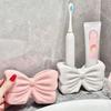 Charming Bow Ceramic Toothbrush Holder - Portable, Drill-free Bathroom Storage for Toothbrushes and Toothpaste