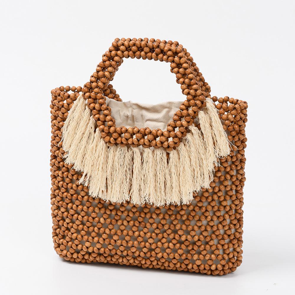 

Summer Large Capacity Tassel Handbag Handwoven Hollow Out Women Beach Holiday Wood Beaded Tote Ethnic Style Netted Canvas Clutch 28x5x24cm коричневый