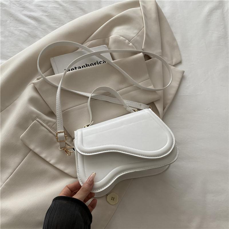 This year's popular temperament women's bag fashion solid color Korean version shoulder bag women's winter classic versatile commuter underarm bag