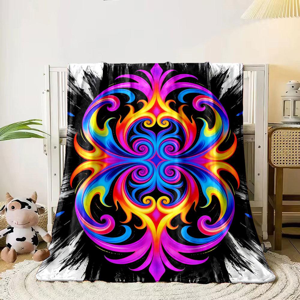 A vibrant, symmetrical swirl pattern with neon hues on a black background. for all seasons blanket lunch break throw gift