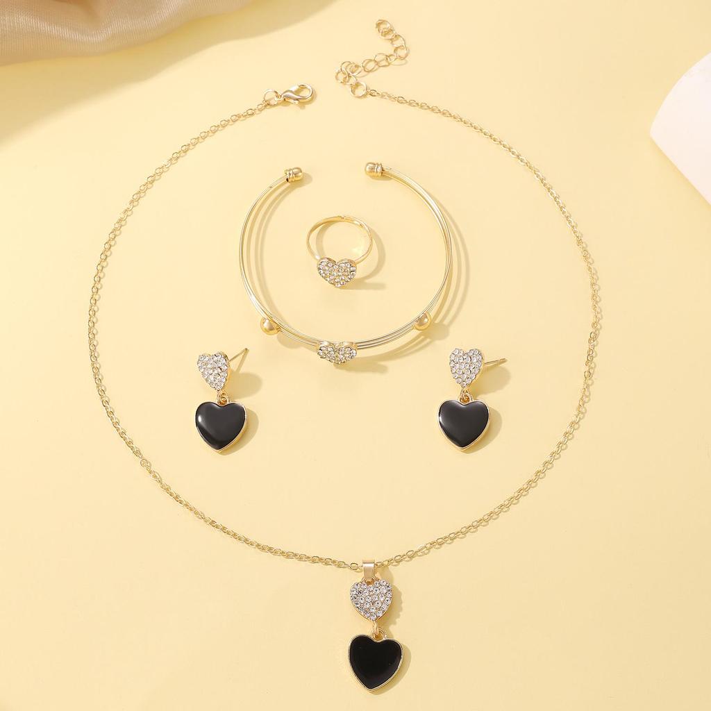 Set di Gioielli Statement Europei e Americani: Orecchini, Anello, Bracciale, Collana a Forma di Cuore, Farfalla e Fiore - Set da 4 Pezzi Moda Donna