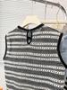 Korean Retro Hollow Sleeveless T-shirt with Tassel Hem - Summer 2024 Women's Western-Style Top