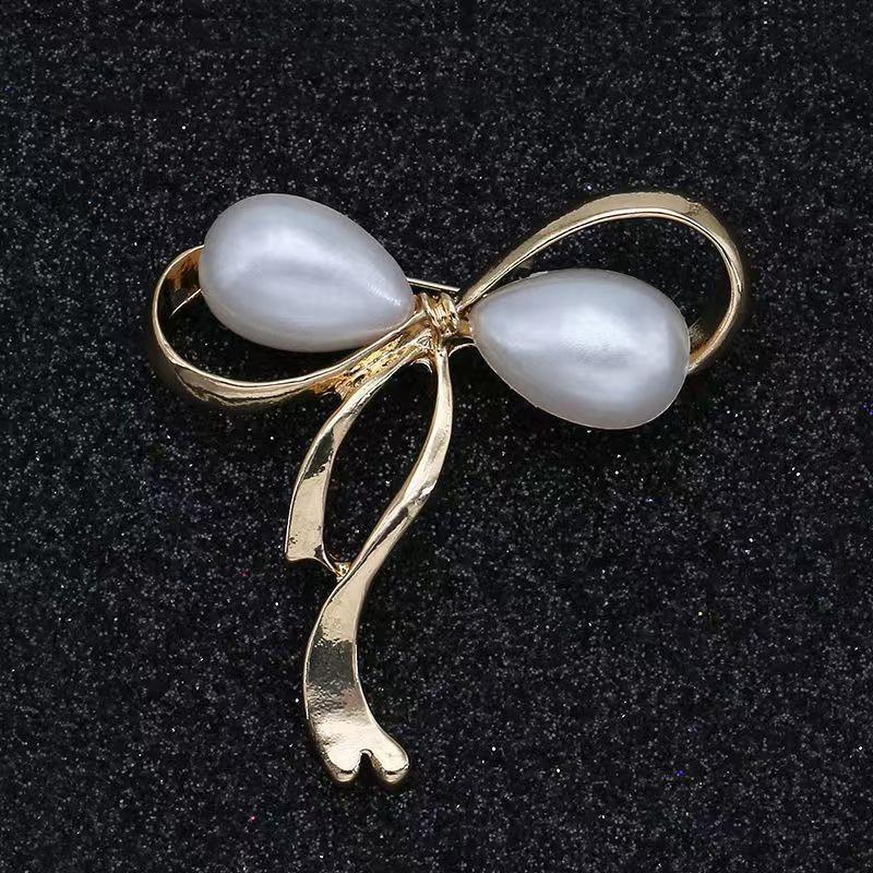 

Big Bowknot Women s Clothing Brooches Water Drop Pearl Beads Luxury Brooch Irregular Design Unusual Women s Brooch for Suit