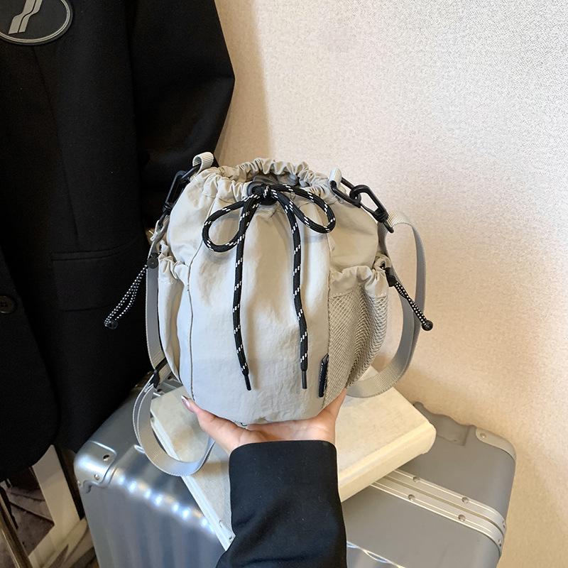 Japanese-Inspired Niche Drawstring Bucket Bag, Versatile Crossbody for Commuting and Outdoor Sports Casual Use