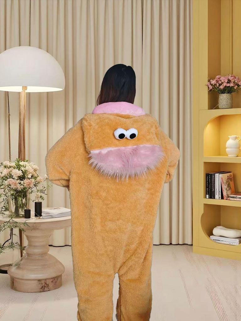 Skurriler Monster-Einteiler - Design mit langem Haar und großem Mund (Winter 2026)