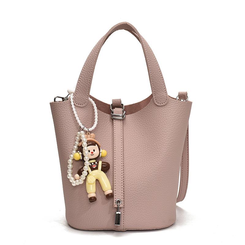 Beliebte tragbare Eimertasche Damen Frühling und Sommer 2025 Neue einfache und lässige Umhängetasche Modische Umhängetasche