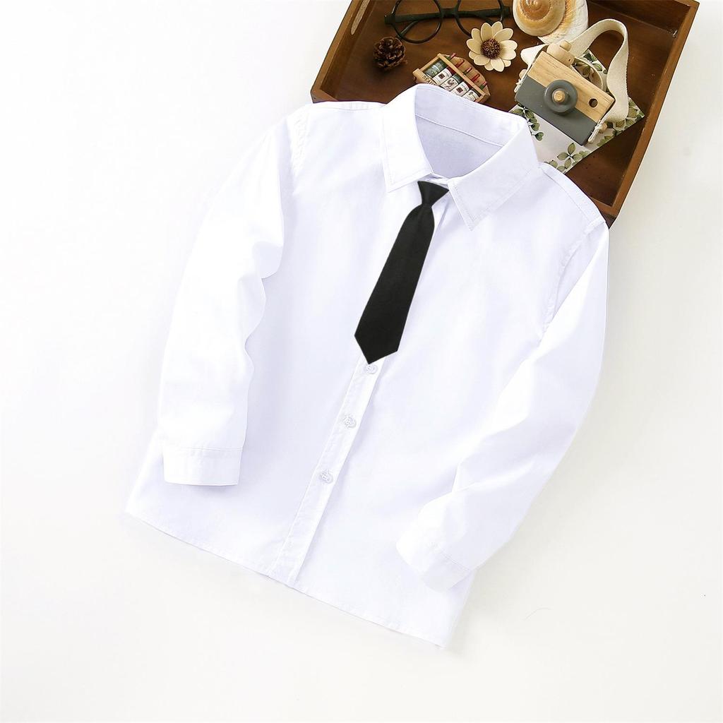 Dziecięce białe koszule bawełniane: Mundurki szkolne i odzież występowa