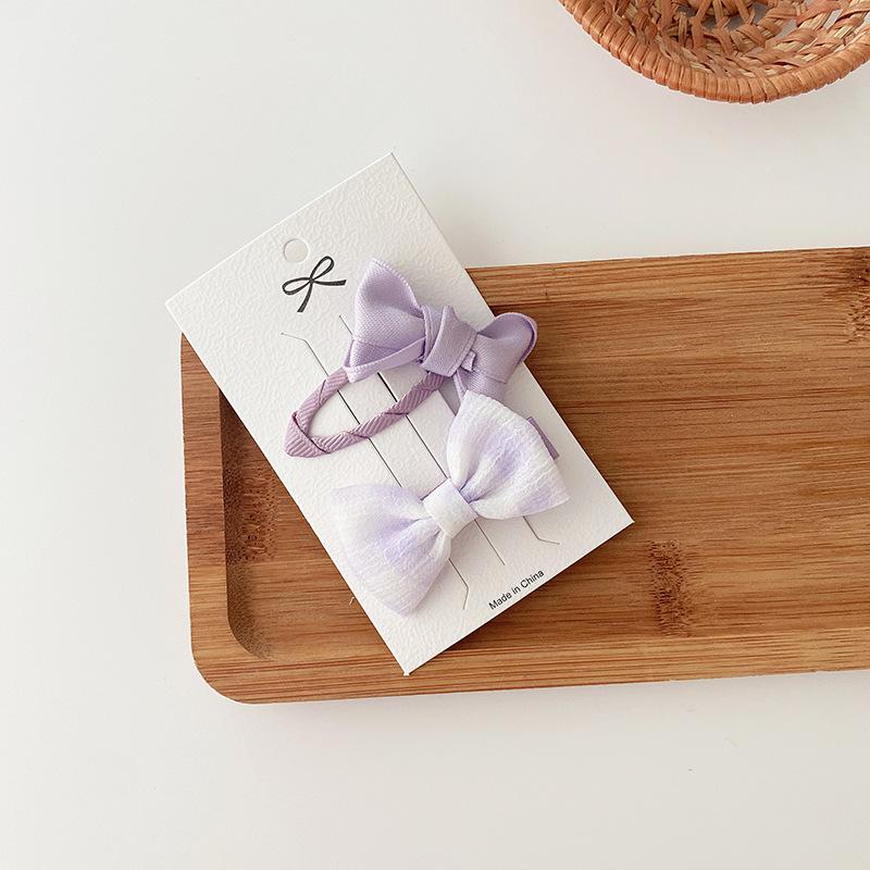 2 Purple Bowknot Hair Clips, Perfect for Korean-style Young Girls, Versatile for Youthful Bangs and Hair Accessories.