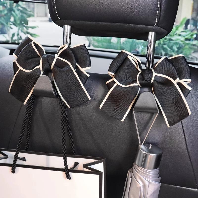 2pcs Cute Bow Car Seat Back Hooks Storage Hook Headrest Organizer Rack Grocery Bag Handbag DecorationInterior Accessories