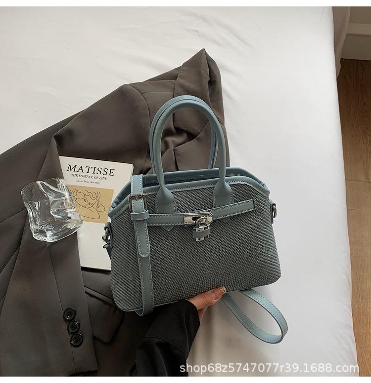 

2025 new niche simple casual bucket bag women s one-shoulder crossbody bag cute retro hand-held shell bag синий