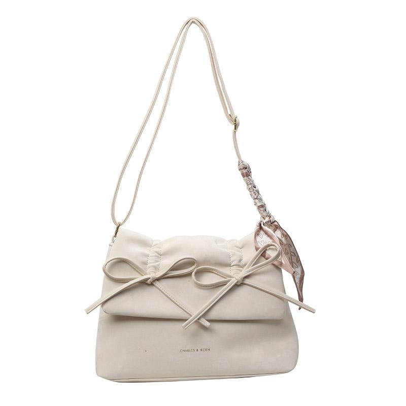 

Женская маленькая квадратная сумка с бантом бежевый