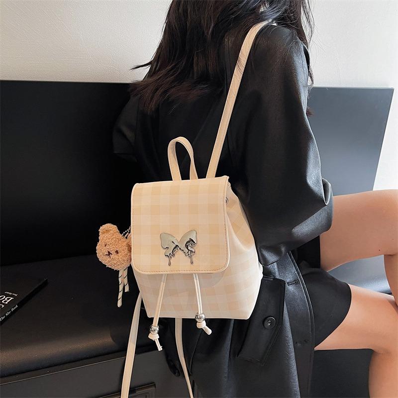 Plaid backpack female fashion niche student class schoolbag bucket bag high value travel small backpack
