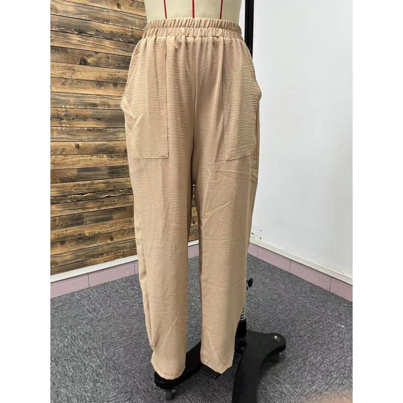 Femei de primăvară și de vară Plus Size culoare solidă buzunare talie elastică pantaloni largi casual cu picior larg