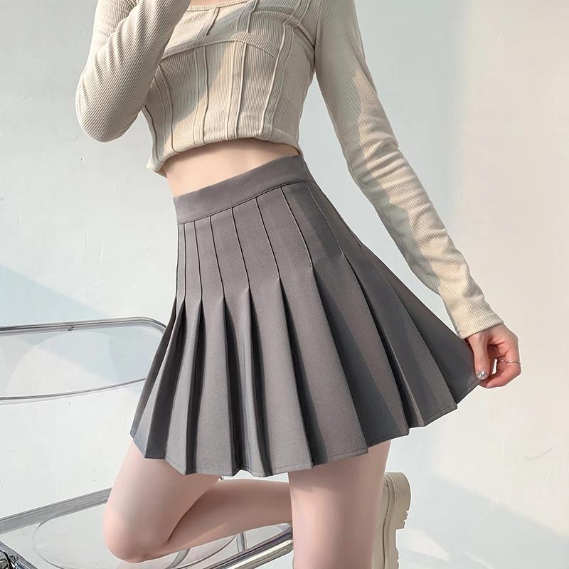 Gonna a pieghe Minigonne sexy a vita alta da donna Gonna da tennis Gonna da ballo per ragazza Gonna nera bianca coreana casual Kawaii