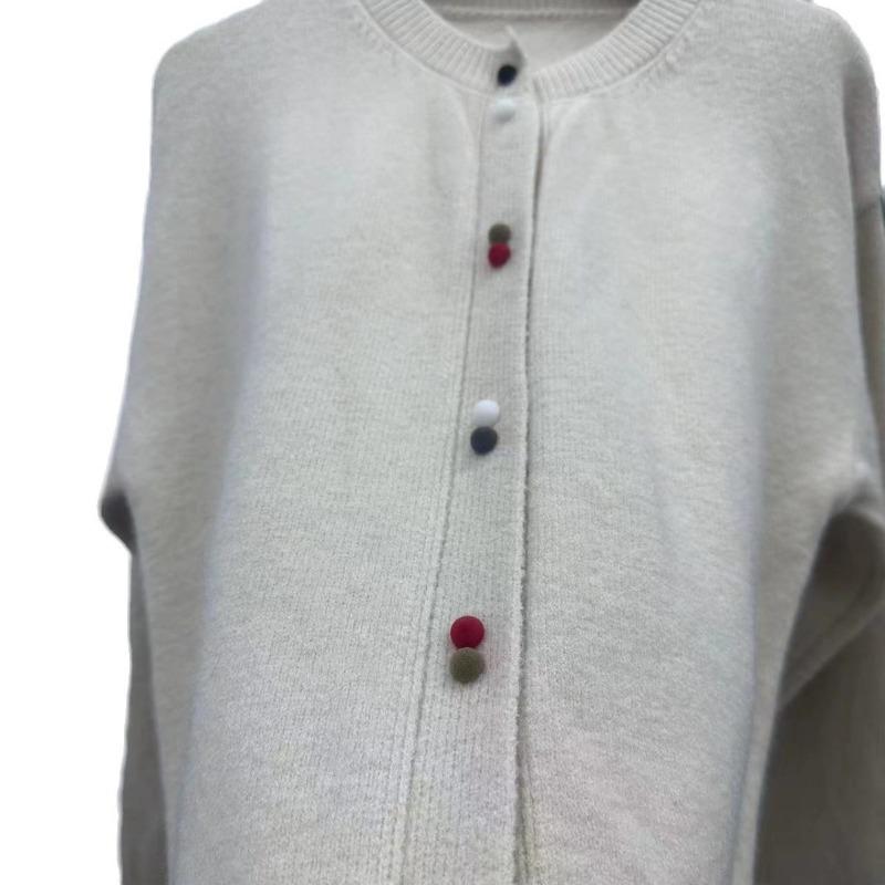 Solid color loose round neck knitted cardigan women's early spring new atmosphere new simple temperament cardigan jacket