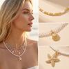 Handgefertigter mehrschichtiger gestapelter Choker aus Reiskörnern für Damen Einfacher Seestern-Muschel-Anhänger Halskette Bohemian Strand Schmuck Geschenke