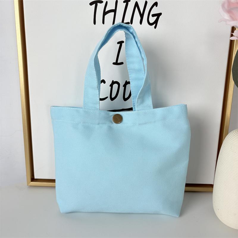 Effenkleurige eenvoudige lunchtas, draagbare canvas tas, kleine stoffen tas, draagbare canvas tas voor het opbergen van diverse spullen