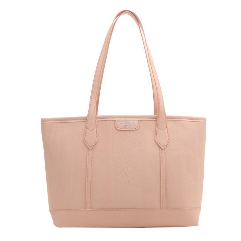

2025 niche Korean version of textured women s large-capacity handbag shoulder bag women s work versatile ins tote bag рожевий