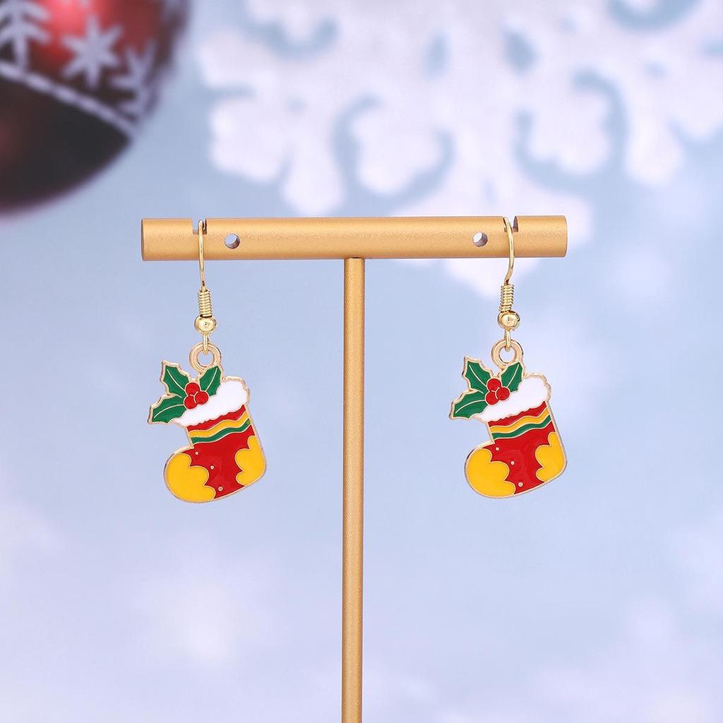 Festive Reindeer & Gingerbread Earrings: Christmas Cartoon Drip Oil Design