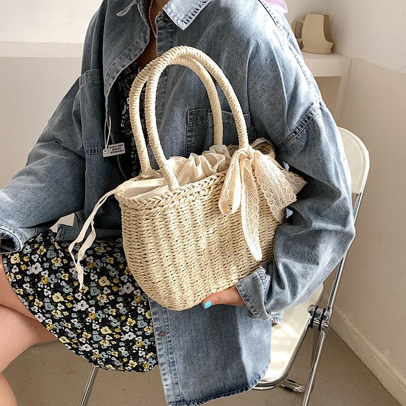 2025 Summer New Straw Bag Women's Seaside Portable Vacation Woven Bag Vegetable Basket Beach Bag Temperament Women's Bag