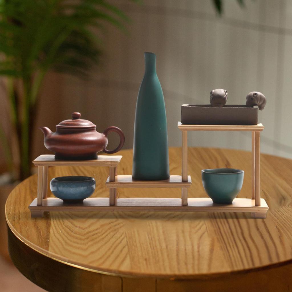 Elegant Wooden Display Stand for Fragrance Bottles and Collectible Figurines