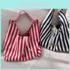 Fashionable Soft Canvas Tote Bag With Spacious Interior And Unique Design