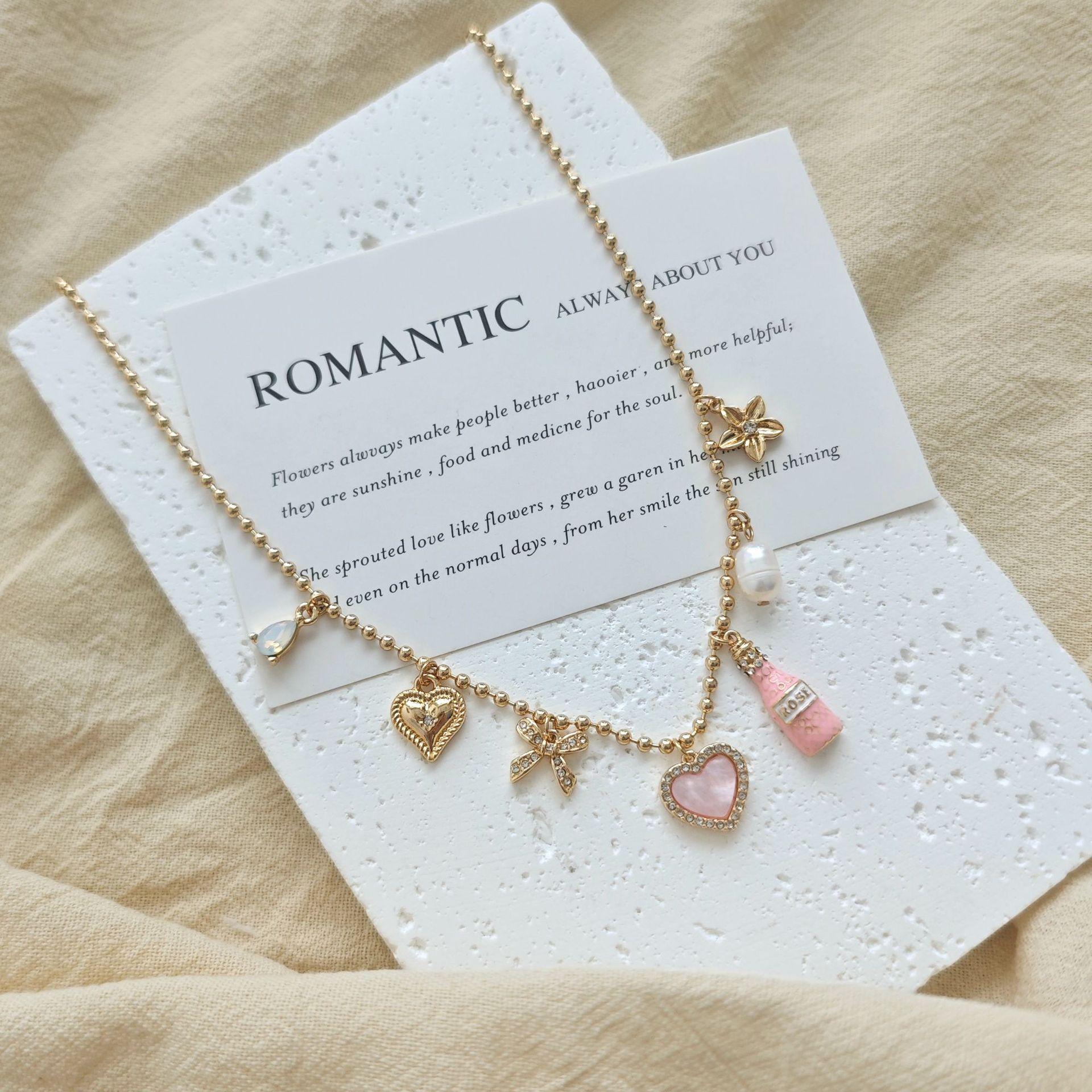 Korean-Style Gold Heart and Pink Multi-Pendant Necklace: Elegant and Sweet Luxury Accessory for Women розовый