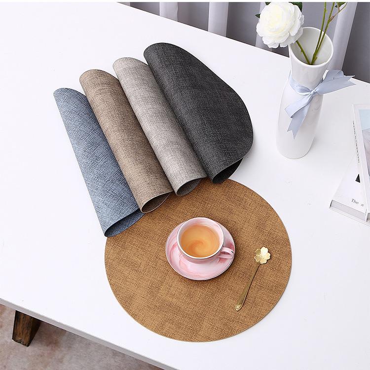 

Japanese Linen Textured Double-Sided Leather Placemat: Heat-Resistant, Non-Slip Round Mat for Home or Hotel Dining. чорний