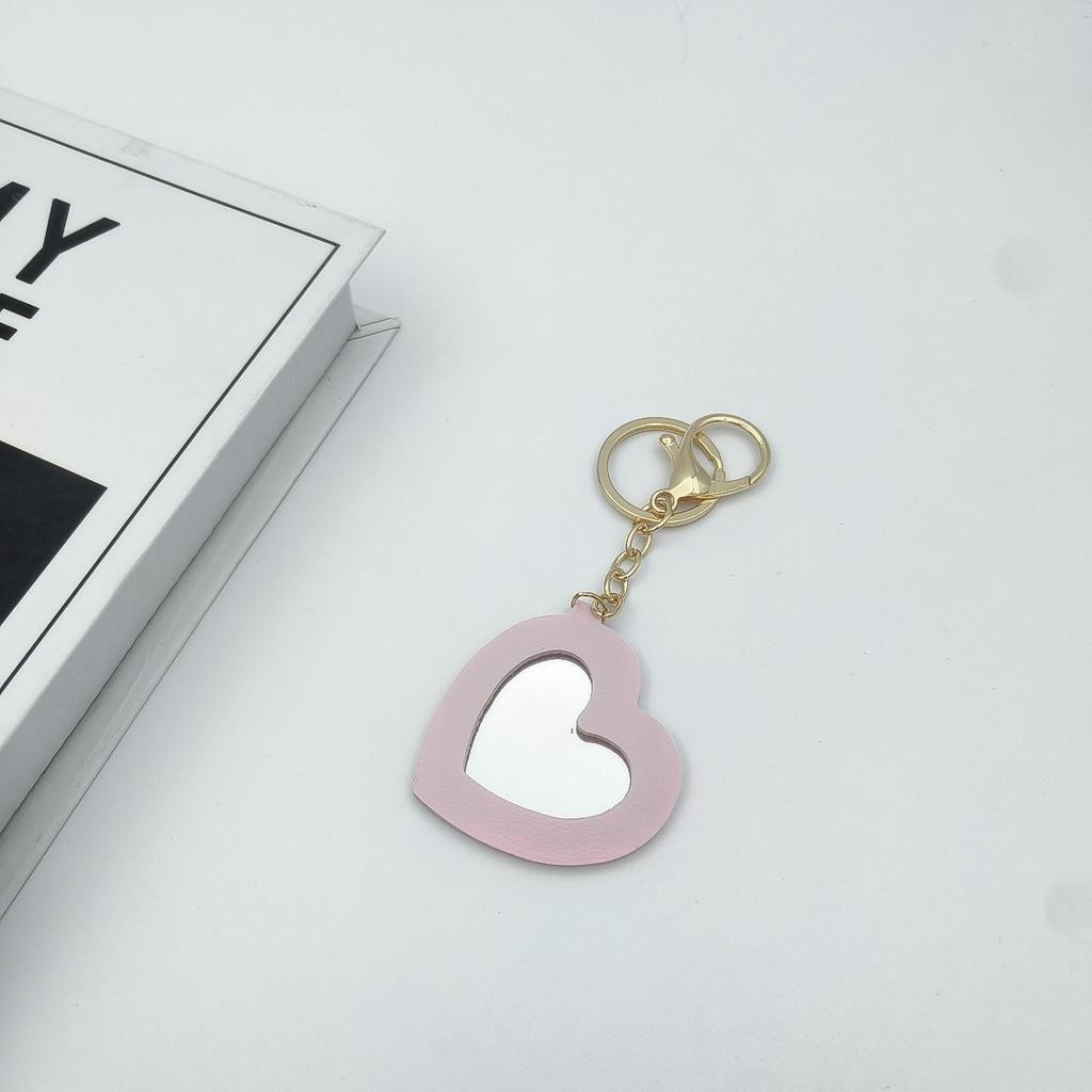 Přenosné pouzdro na rtěnku ve tvaru srdce s ochrannou kůží a roztomilou klíčenkou s přívěskem