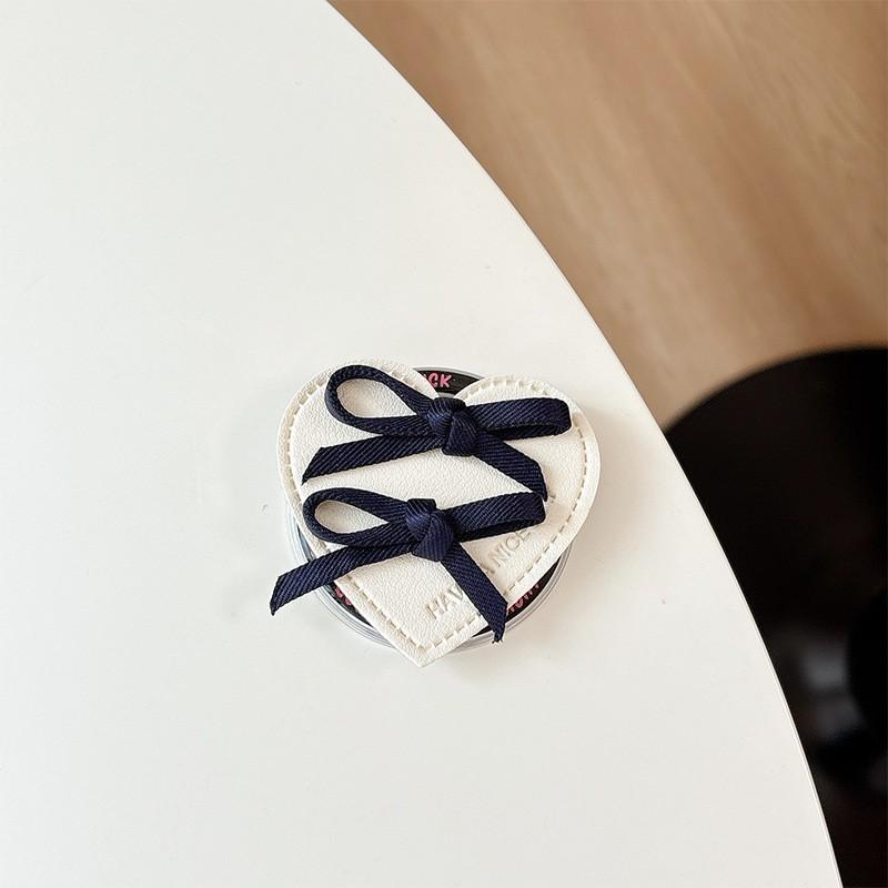 

Korean Ins New Bow Leather Heart Phone Airbag Holder Magnetic Desktop Simple Niche
