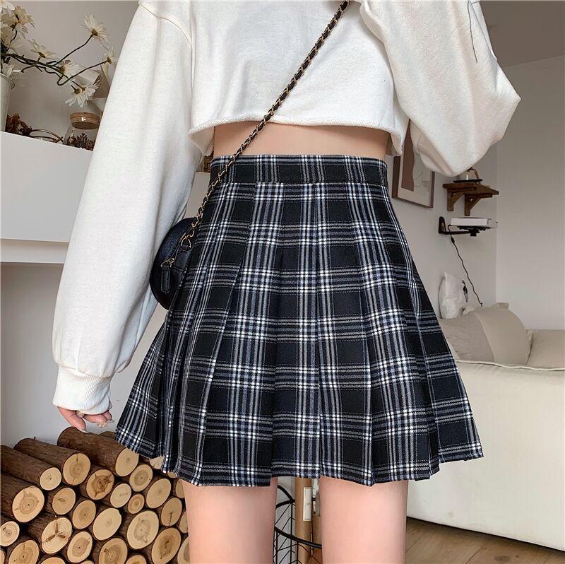 

Маленькая черная клетчатая юбка А-силуэта: Миди, С высокой талией, Стройнящий, Омолаживающий, Летняя мода. M