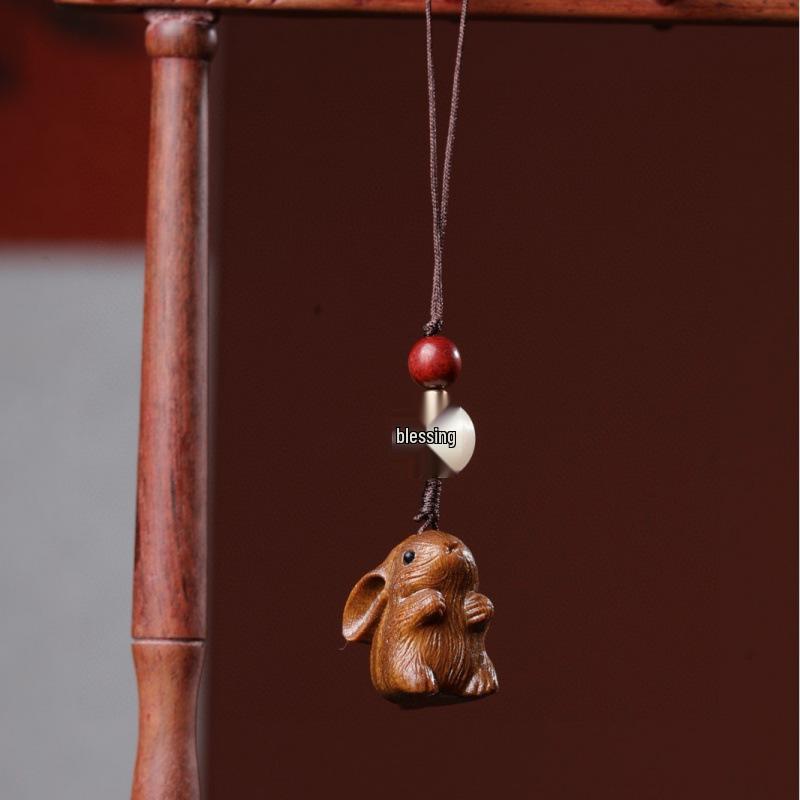 Twelve Zodiac Animal Charms Green Sandalwood Set: Rat, Ox, Tiger, Rabbit, Dragon, Snake, Horse, Sheep, Monkey, Rooster, Dog, Pig.