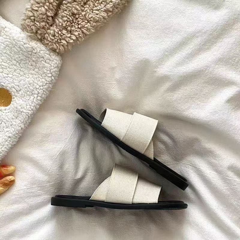 Simple Casual Lazy Niche High Sense One-word Drag 2025 New Beautiful Flat Bottom Cool Slippers Women's Summer Wear