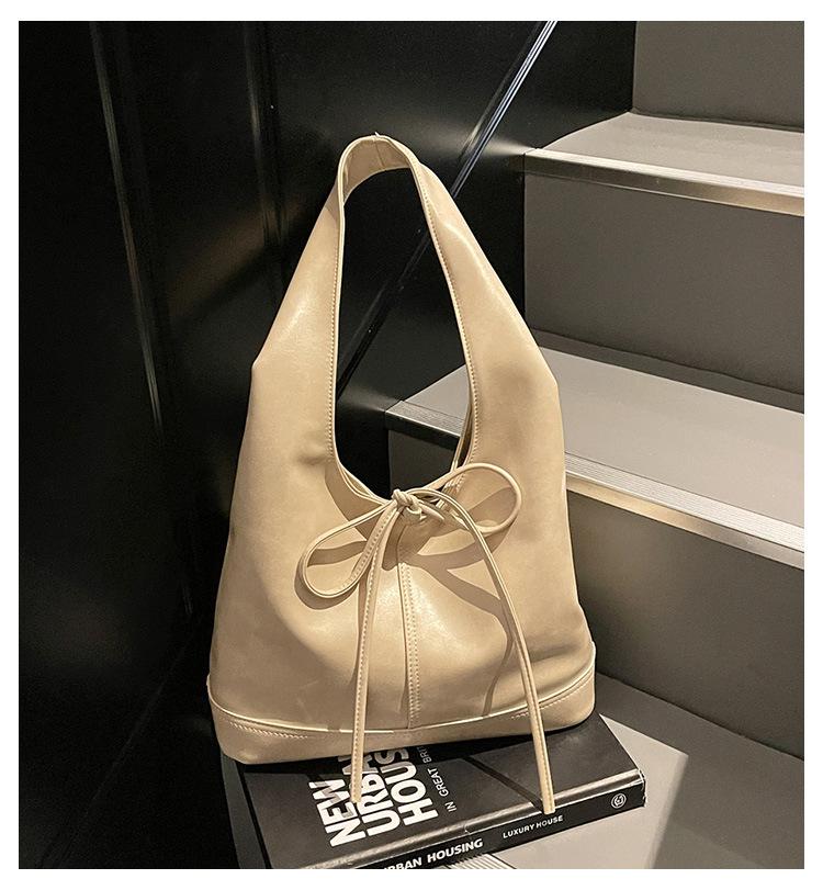 Koreanische, stylische Handtasche mit großem Fassungsvermögen und Schleifenverschluss – trendiges Design für Damen