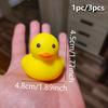 1 random colored mini pet sound toy in the shape of a duckling, squeaking sound