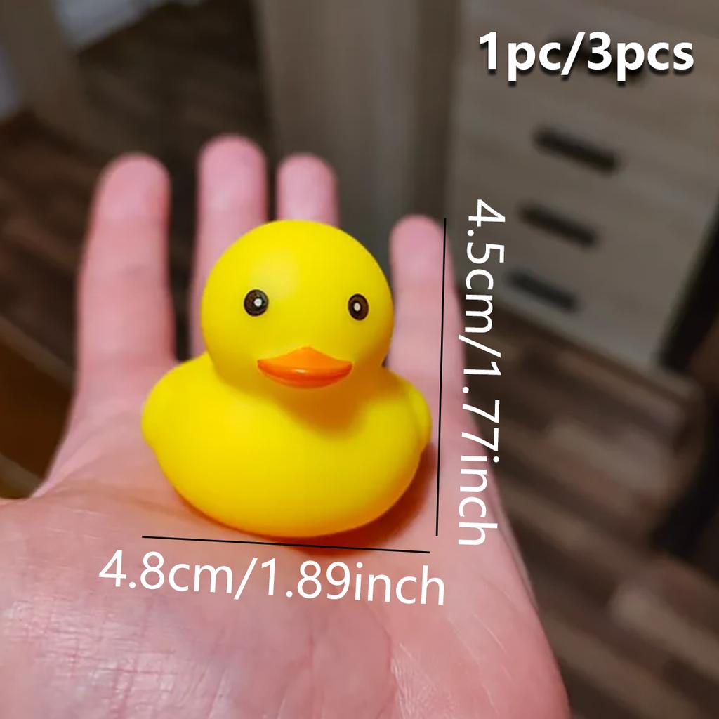 1 random colored mini pet sound toy in the shape of a duckling, squeaking sound