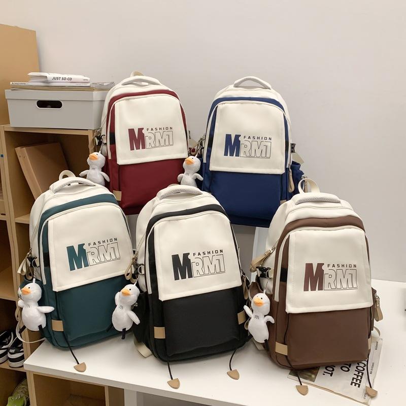 College style large letter color matching student schoolbag spring new large-capacity junior high school backpack