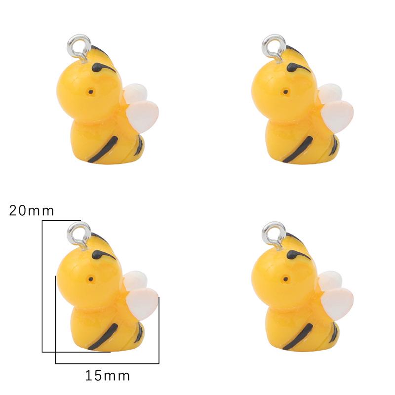 DIY pryskyřičné šperky a doplňky: Přívěsky Žlutá kachnička, Včelka, Růžový medvídek, Kobliha, Dinosaurus, Vejce, Lízátko.