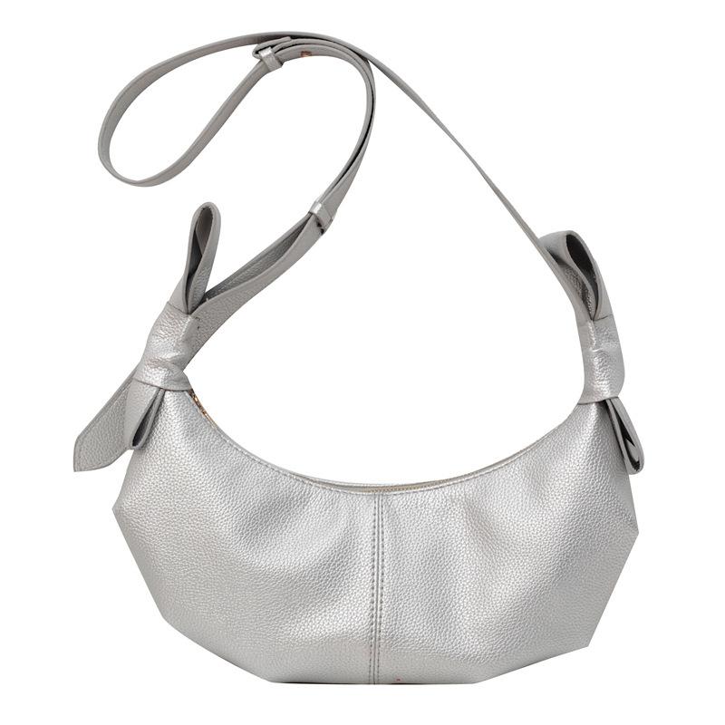 This year, the popular small bag women's 2025 spring new messenger bag high-end texture versatile single shoulder crescent dumpling bag