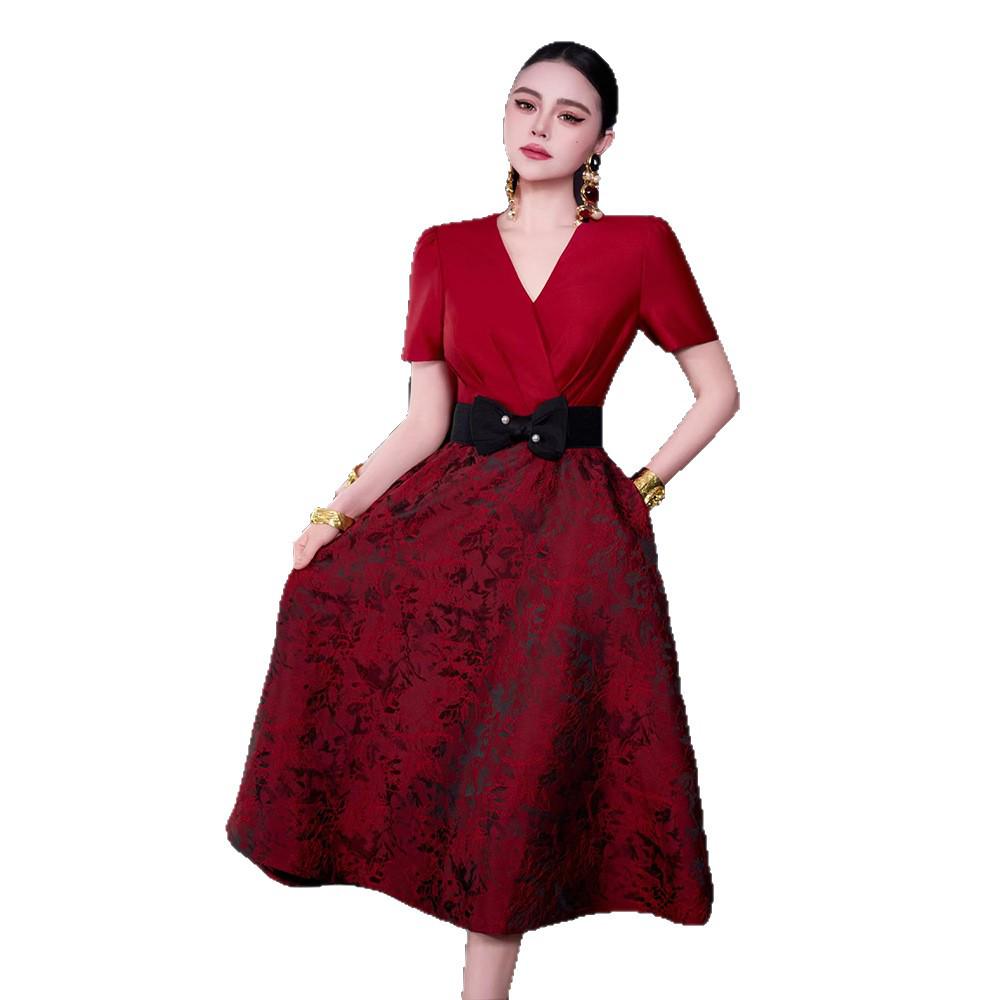 French Spring/Summer 2026 Women's V-Neck Black Bow Tie Jacquard Dress with Waist-Cinching and Wide Hem.