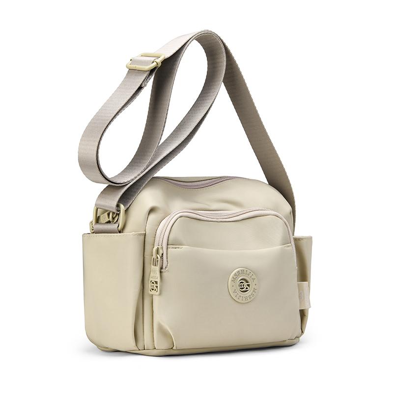 Compact Crossbody Bag with Front Zip Pocket and Side Pockets