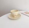 European coffee cups and sauce sets afternoon cups embossed three-dimensional roses creamy yellow ceramic plates
