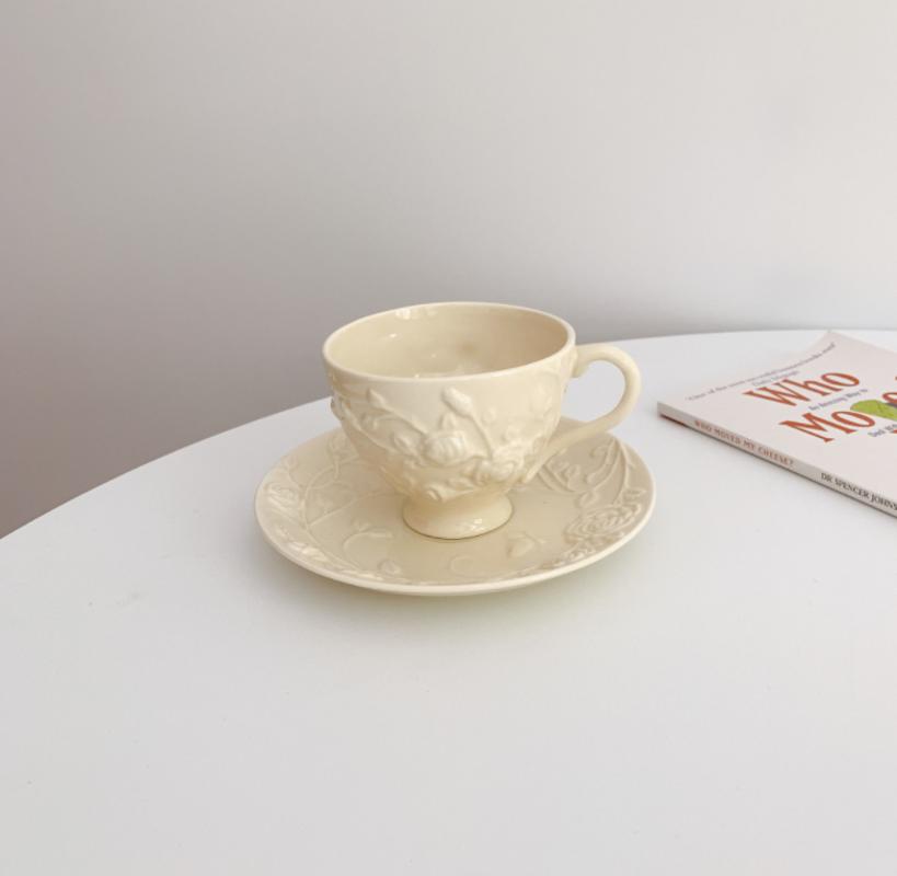 European coffee cups and sauce sets afternoon cups embossed three-dimensional roses creamy yellow ceramic plates